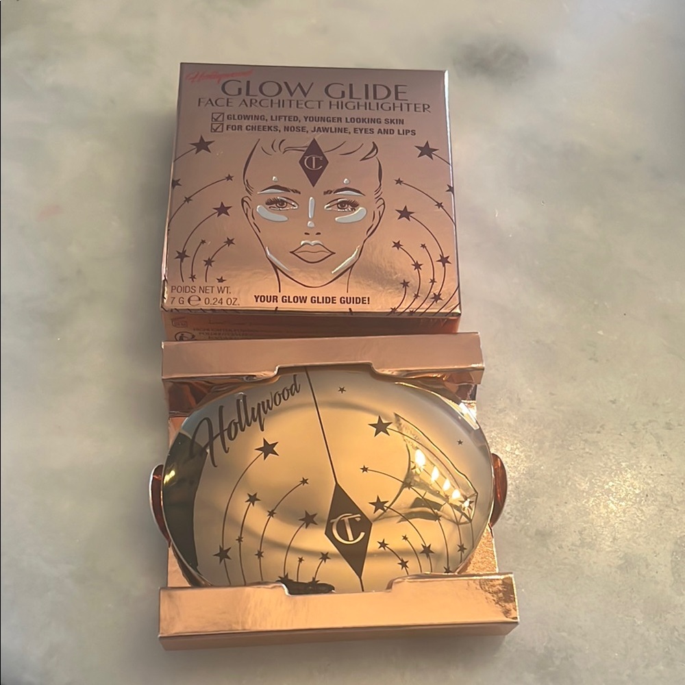 Charlotte Tilbury Gold Highlighter with Luxurious Packaging and Smooth Texture